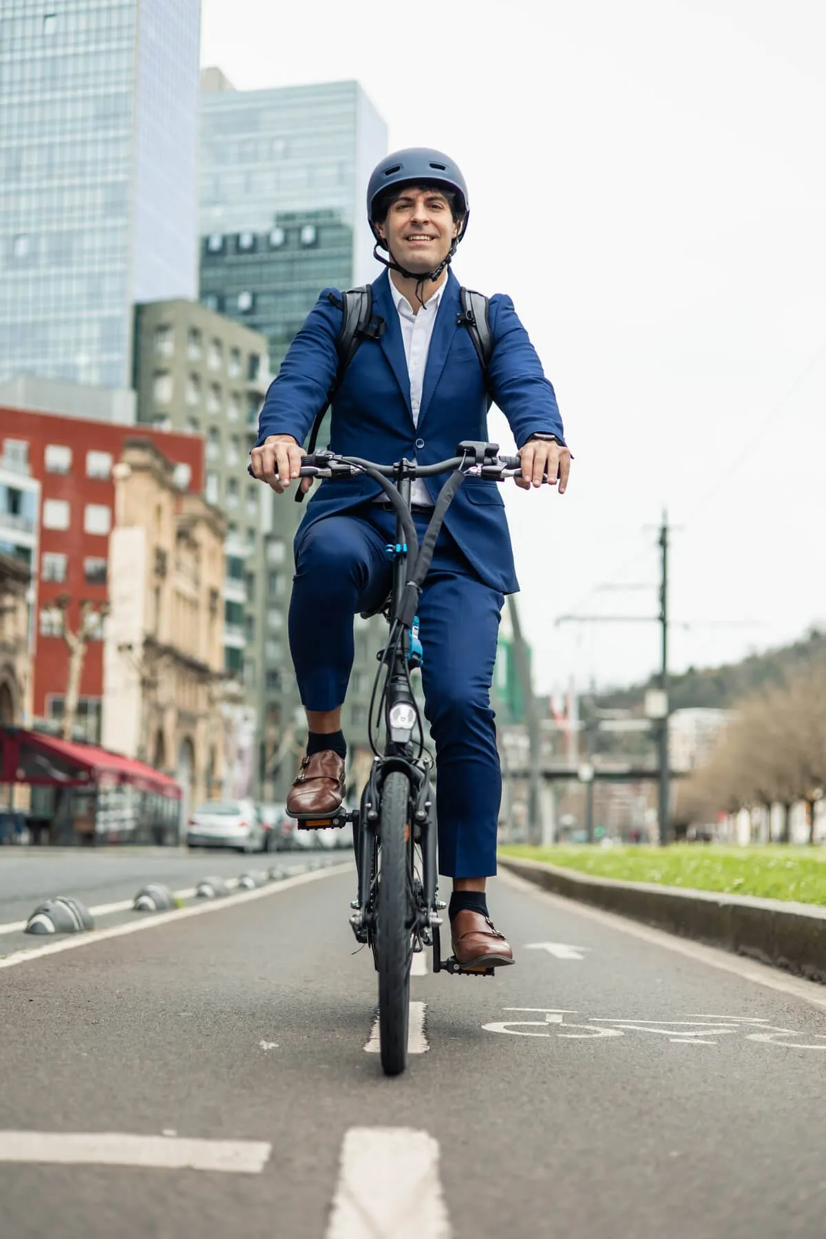 Businessman commuting on a bike